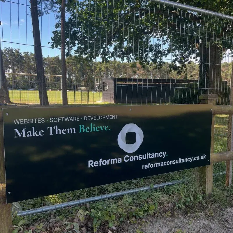 The Reforma Consultancy sponsorship board at the Loxwood Sports Association ground